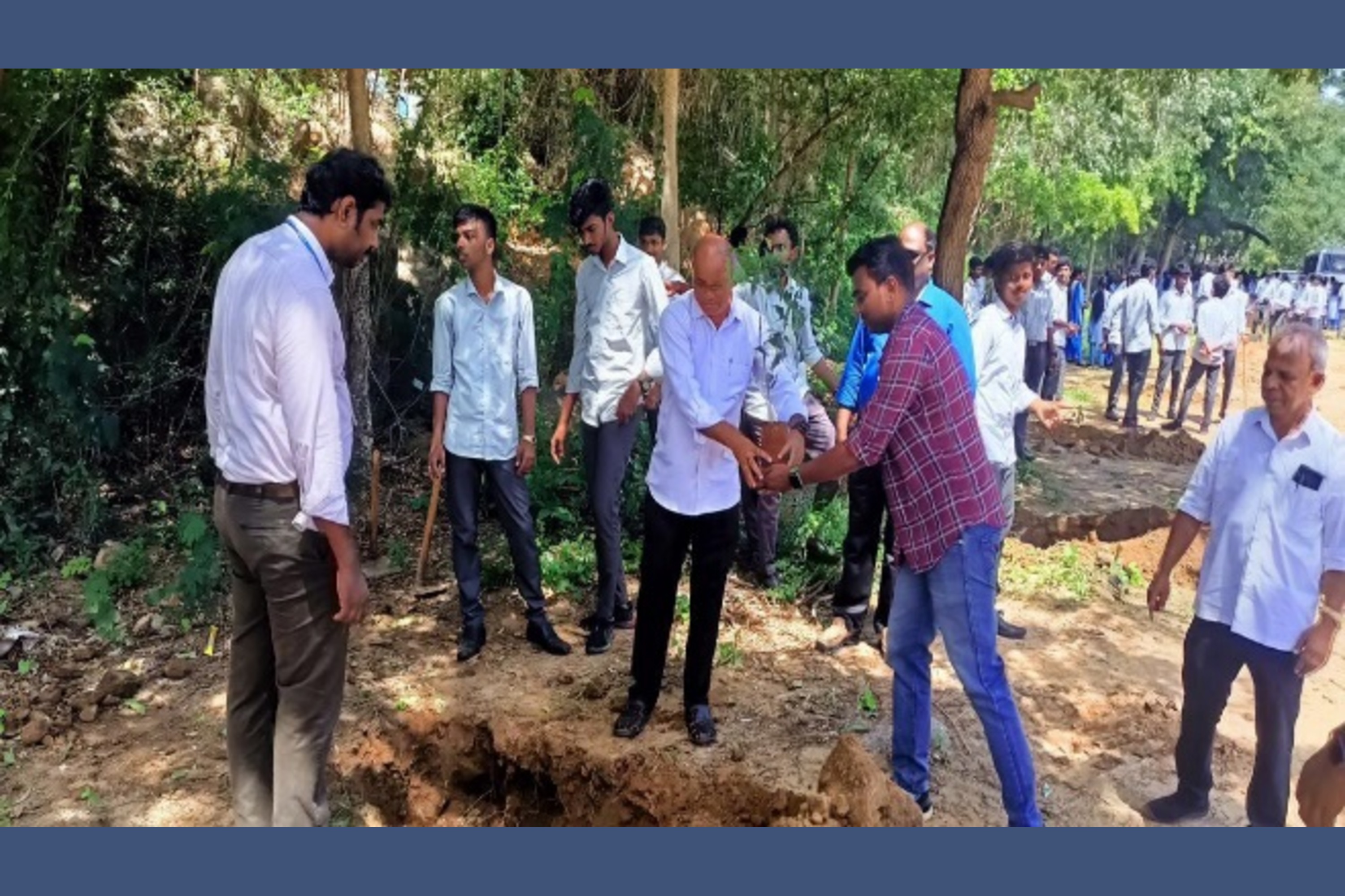 Planting a tree with the Programme Officers